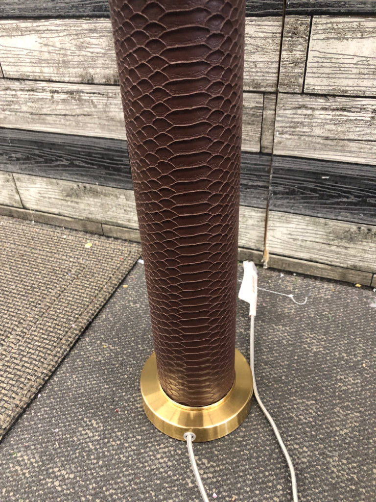 FAUX LEATHER GOLD BASE LAMP W/TAN SHADE.