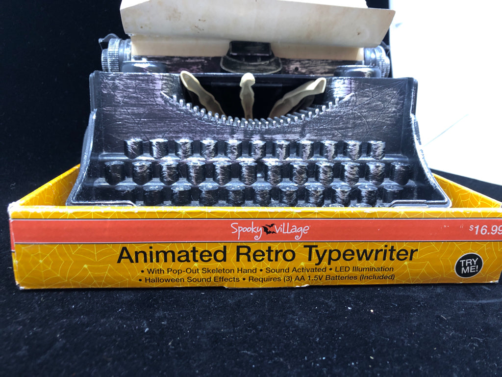 ANIMATED RETRO TYPEWRITER WITH SKELETON HAND AND SCARY SOUNDS