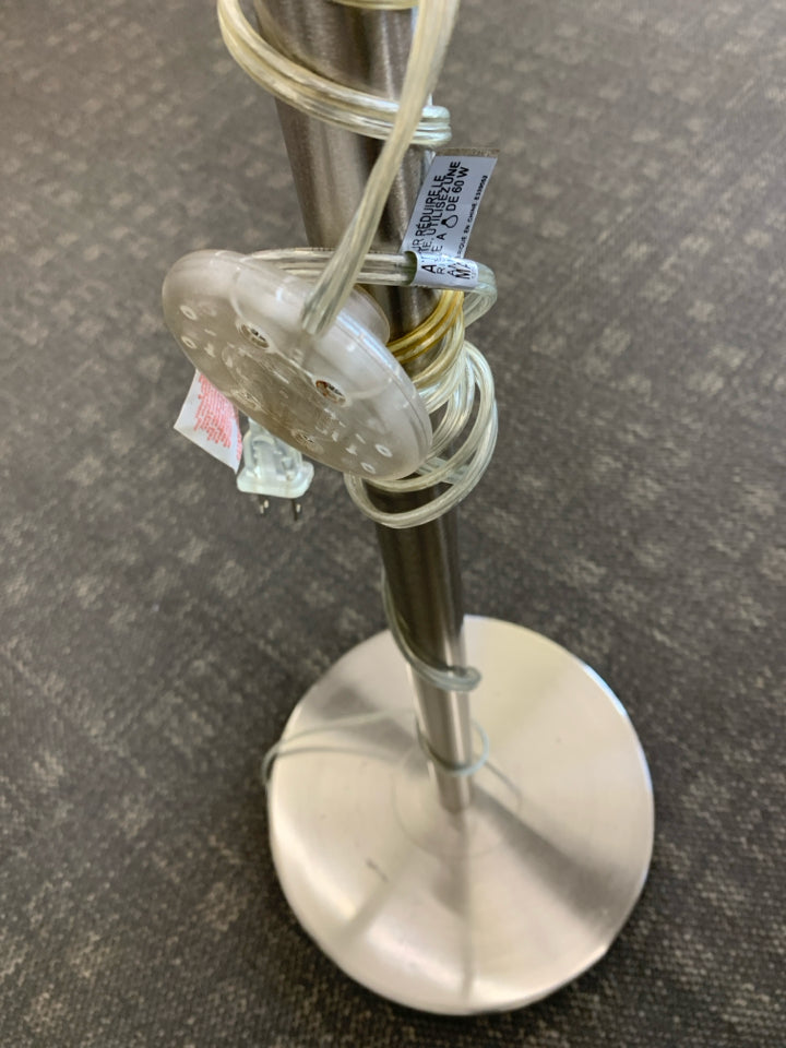 TALL SILVER FLOOR LAMP W/CREAM SHADE.