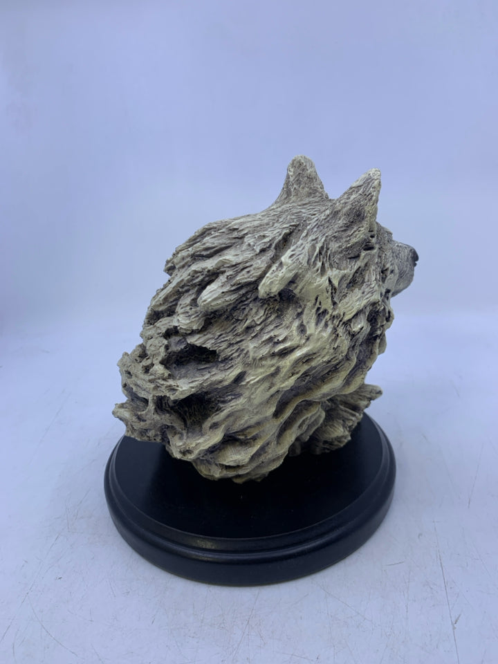 LIGHT WEIGHT WOLF HEAD ON STAND.