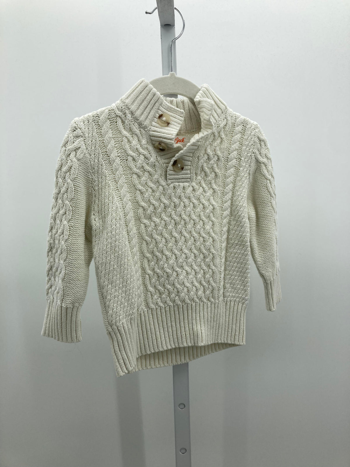 CABLED SWEATER