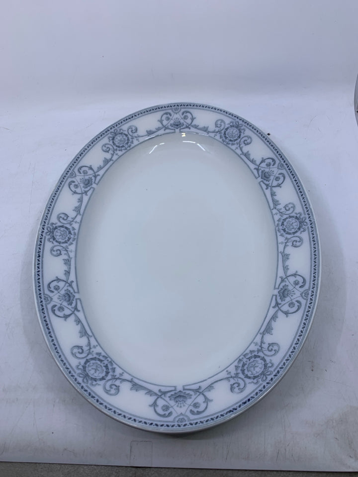 LARGE OVAL WHITE SERVING PLATTER W/ BLUE FLORAL & SCROLL EDGE.