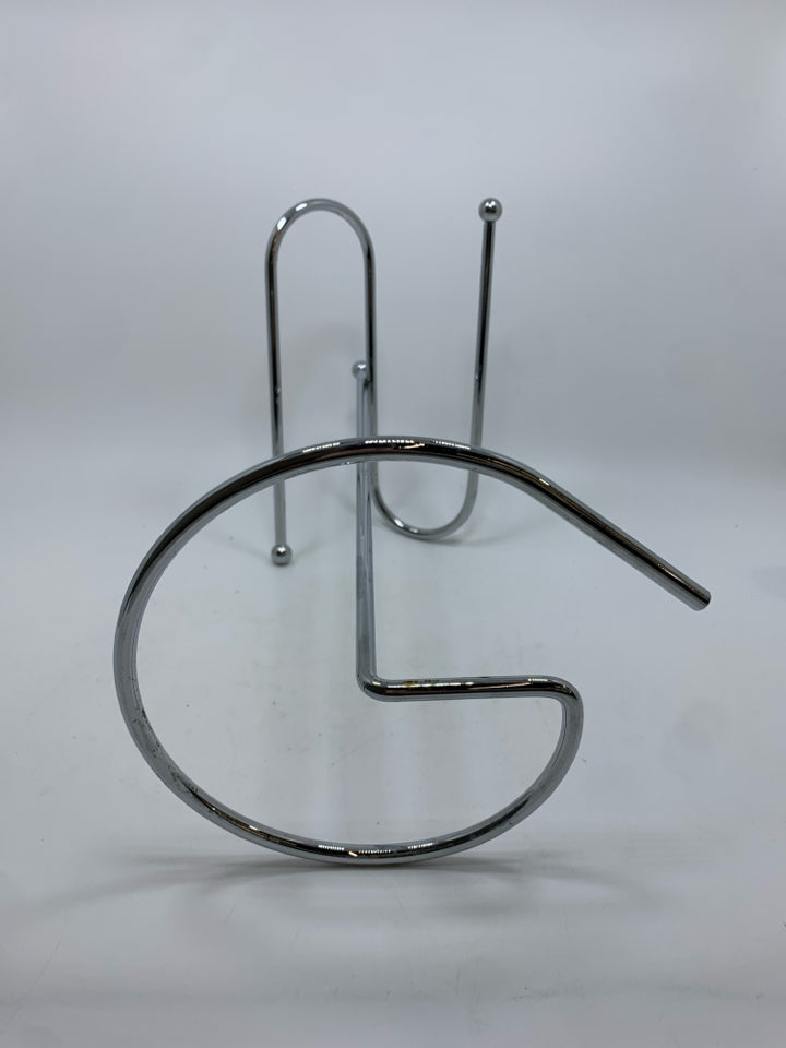 SILVER METAL TOWEL HOLDER.