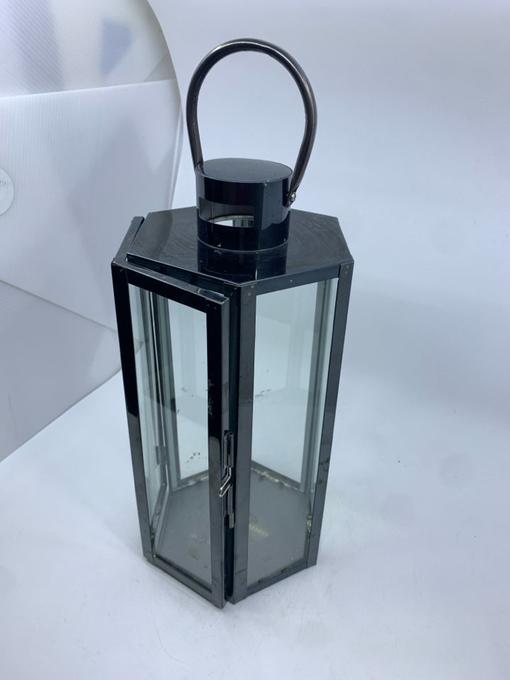 METALLIC LANTERN W GLASS DOORS.