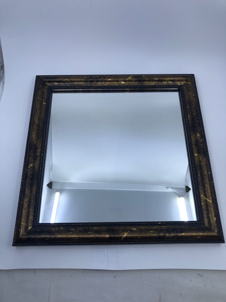 GOLD AND BLACK FRAME WALL MIRROR.