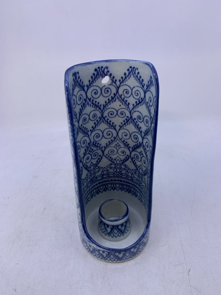 BLUE WHITE DESIGNS TAPERED CANDLE HOLDER.