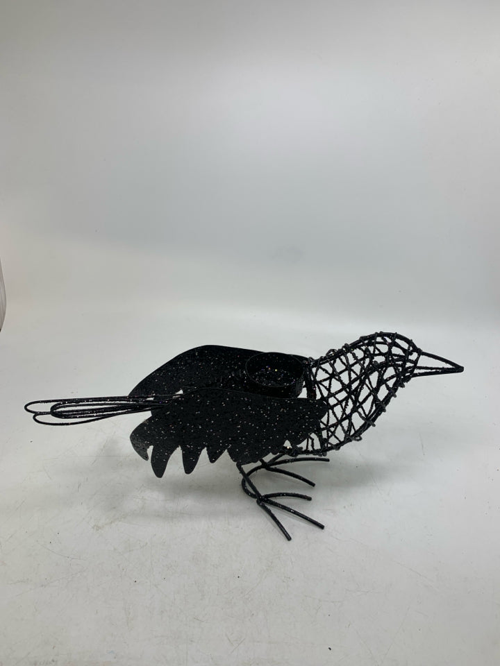 BLACK SPARKLE CROW TEA LIGHT HOLDER.
