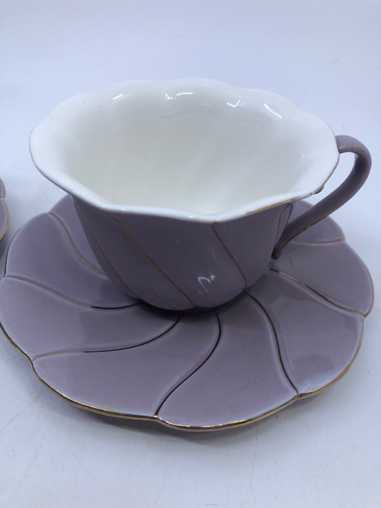 2 PURPLE AND GOLD ACCENT TEACUP + SAUCERS - 2 CUPS, 2 SAUCERS.