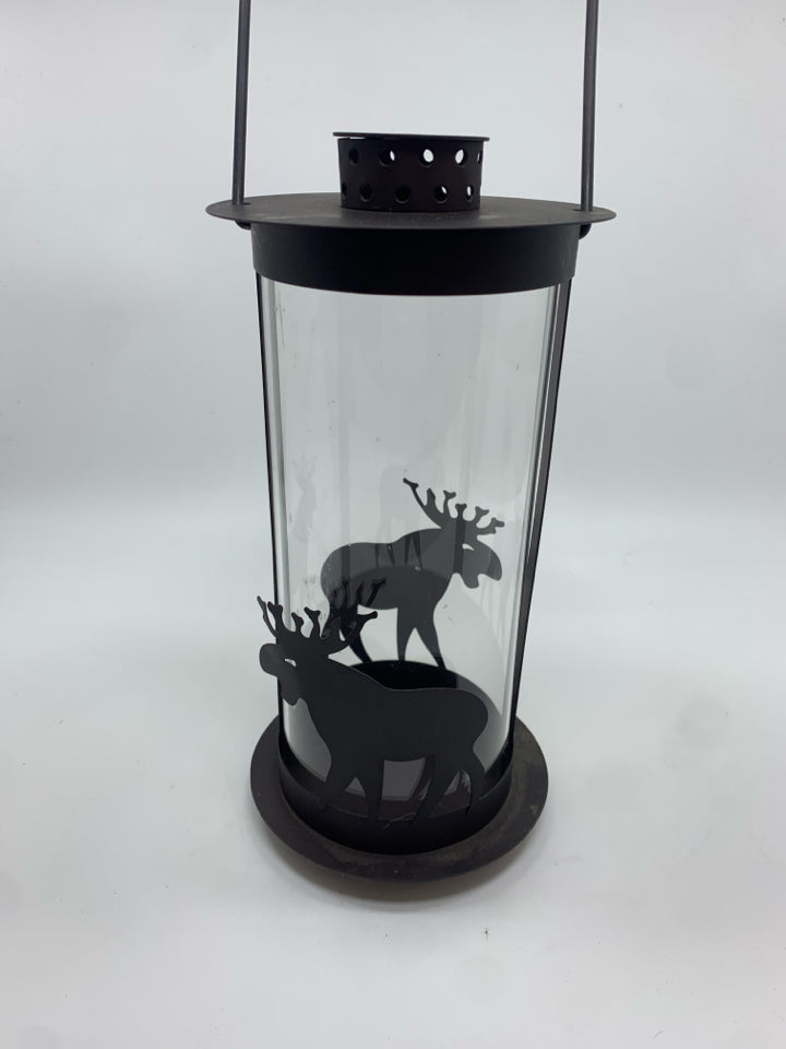 ROUND BROWN METAL MOOSE LANTERN W/CLEAR GLASS.