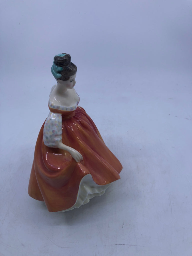 FAIR LADY IN CORAL DRESS W TEAL BOW.