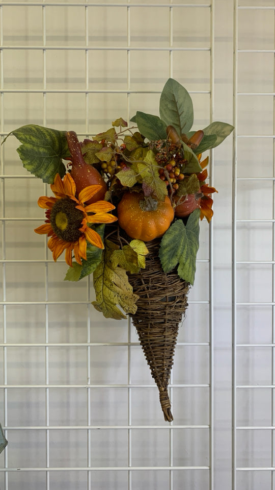 FAUX ORANGE CORNUCOPIA FLORAL ARRANGEMENT.