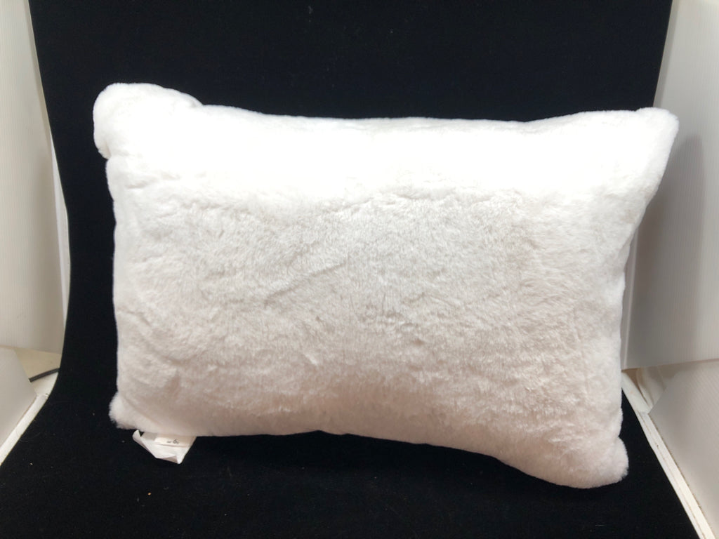 FLUFFY WHITE PILLOW.