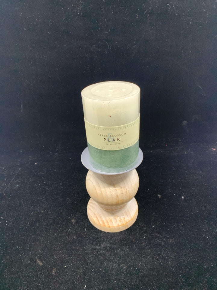 WOODEN CANDLE HOLDER WITH CANDLE.