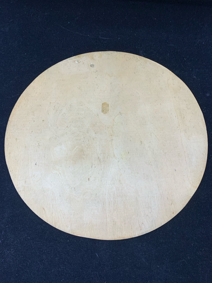 ROUND WOOD WOMAN HOLDING WHEAT WALL HANGING.