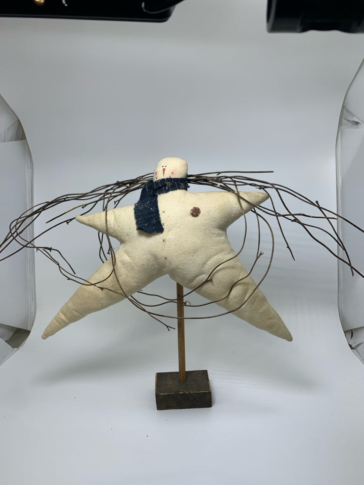 PRIMITIVE STAR SNOWMAN W/ STICK WREATH ON STAND.