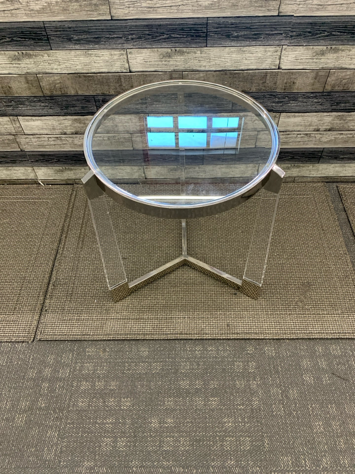 SILVER AND GLASS CIRCLE END TABLE W/ 3 LEGS.