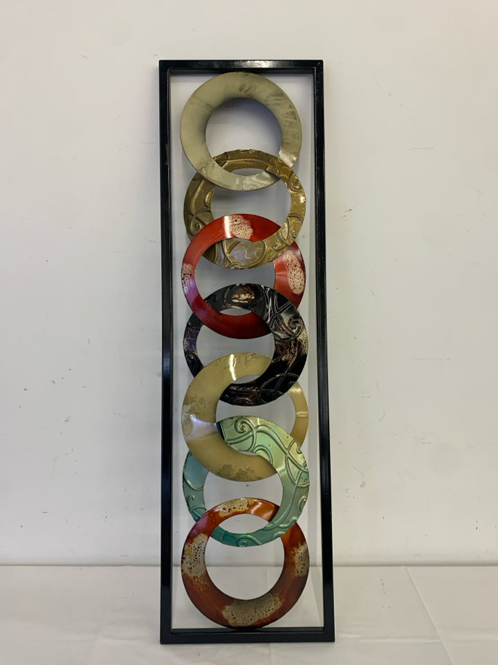 ABSTRACT CIRCLES METAL WALL HANGING.