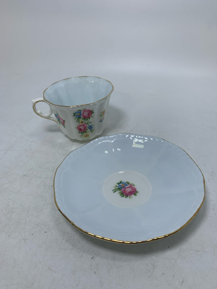 PINK/BLUE FLOWERS W/ GOLD RIM.