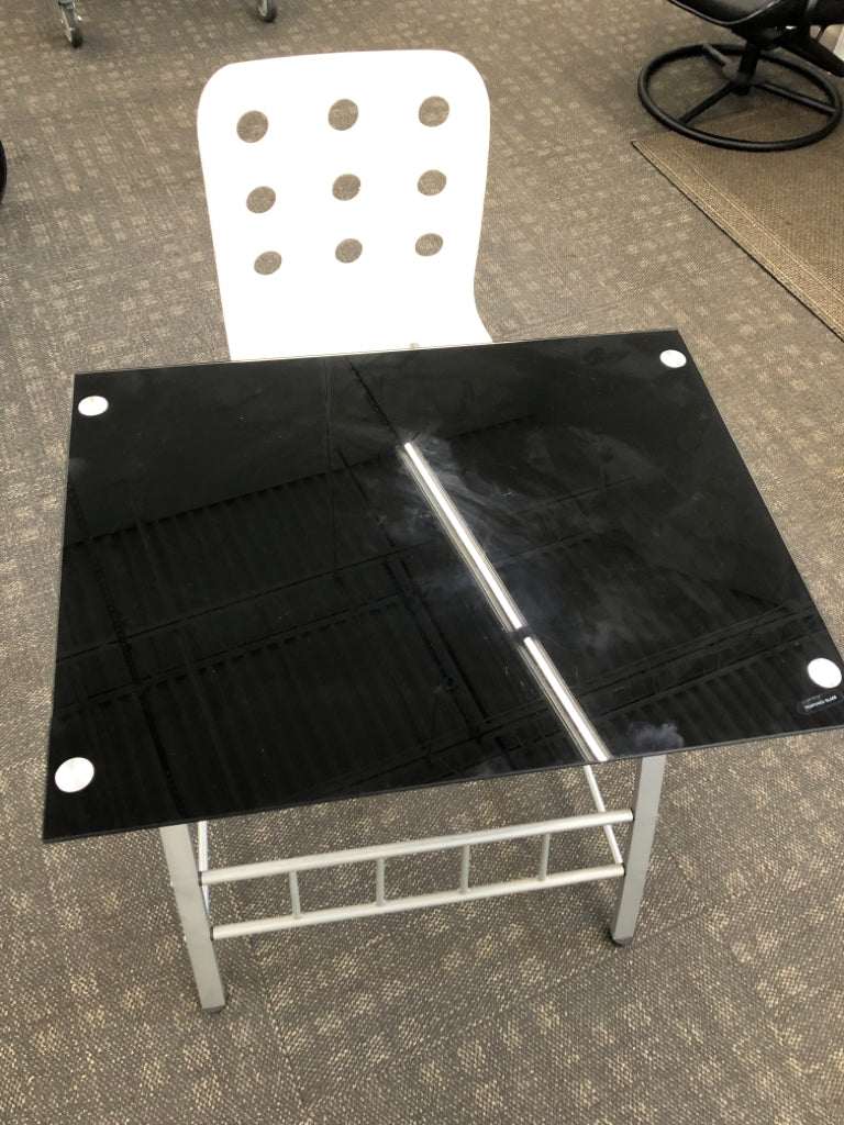 GLASS STUDENT DESK W/WHITE ROLLING CHAIR AND LAP SHELF.