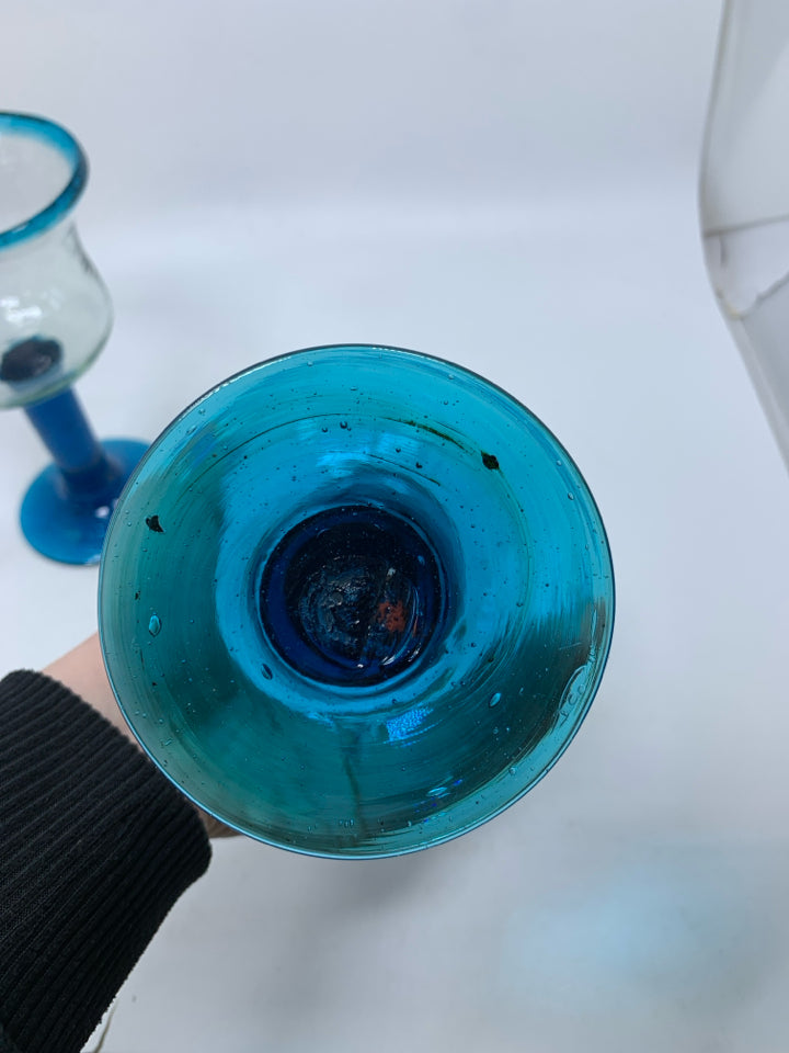2 HAND BLOWN BLUE STEM WINE GLASSES.