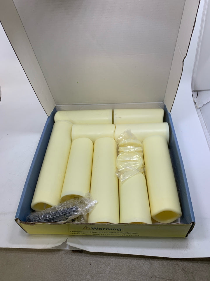 IN BOX 9 FLAMELESS CANDLES.