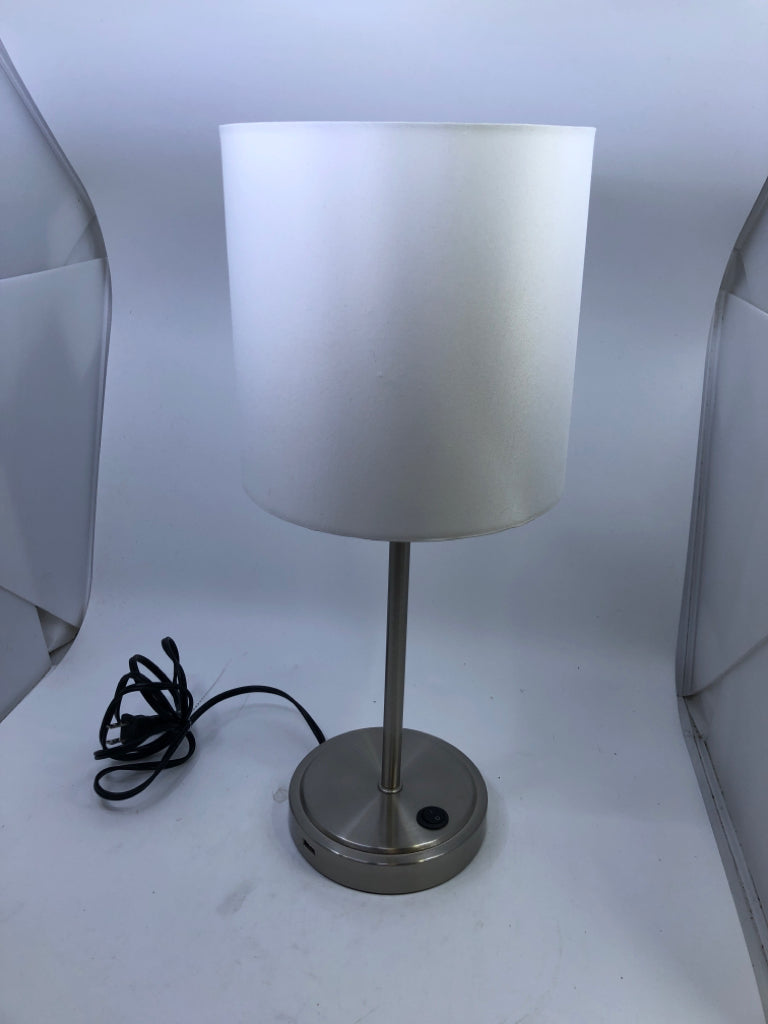 SKINNY SILVER METAL BASE LAMP W/ WHITE SHADE.