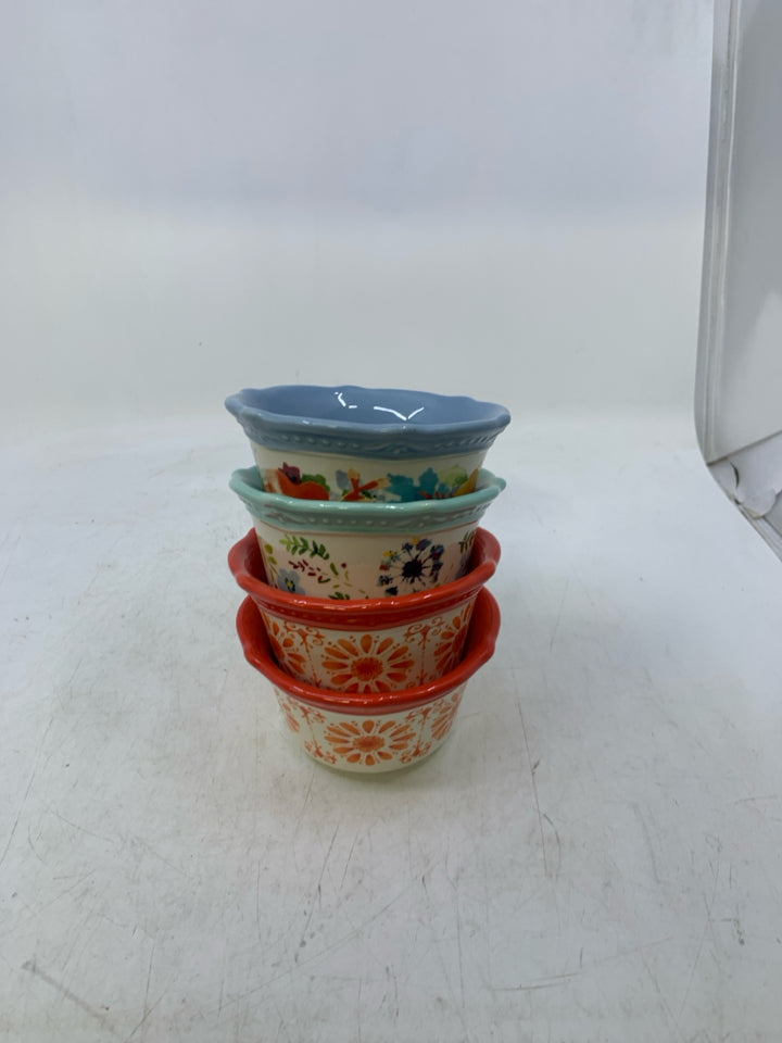 4 ASSORTED FLORAL SPICE BOWLS.