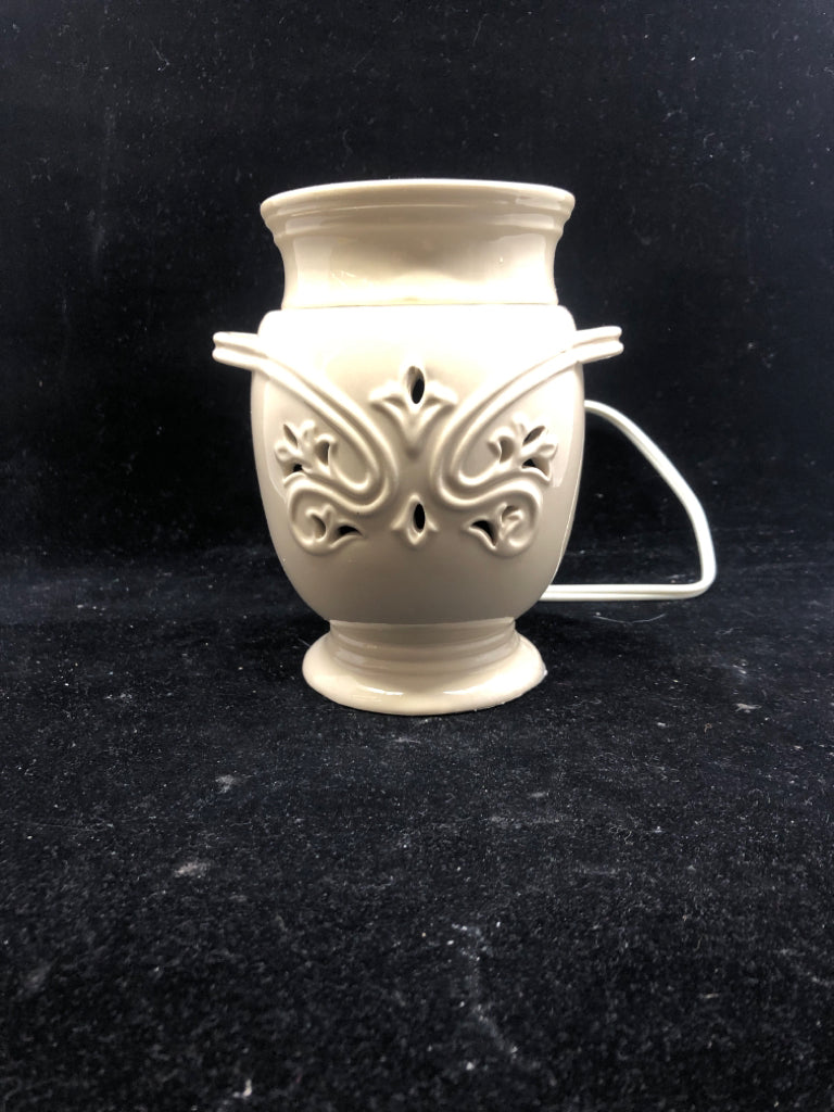 CREAM EMBOSSED WAX WARMER.