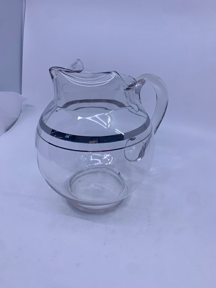 ROUND BULB PITCHER W SILVER RIM.