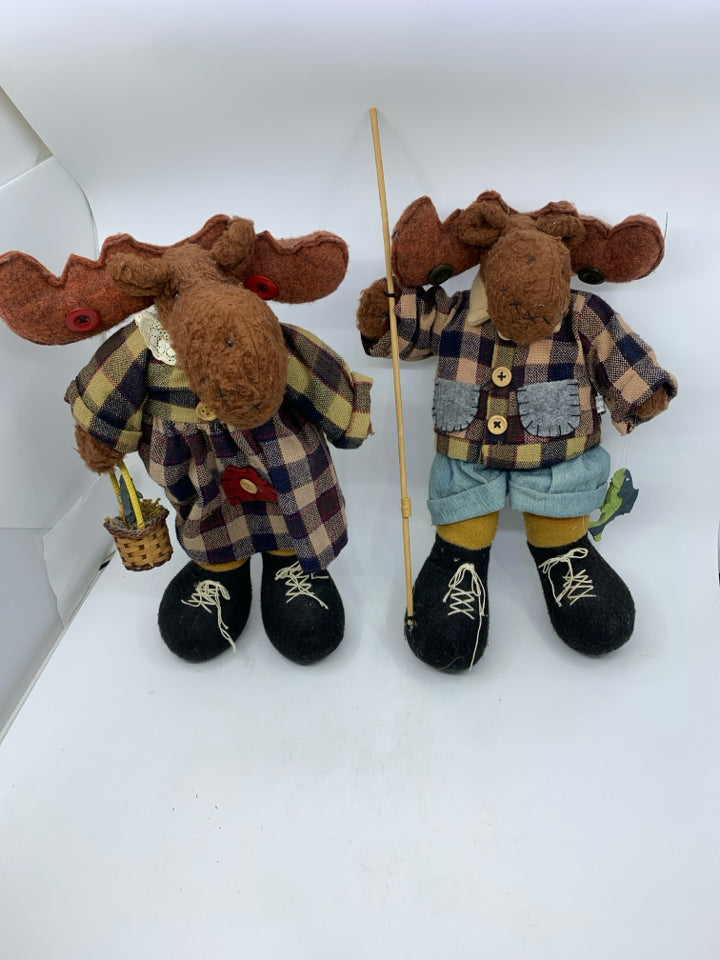 2 PLUSH MOOSE IN PLAID ON HOLDING FISHING GEAR HEAVY FEET.