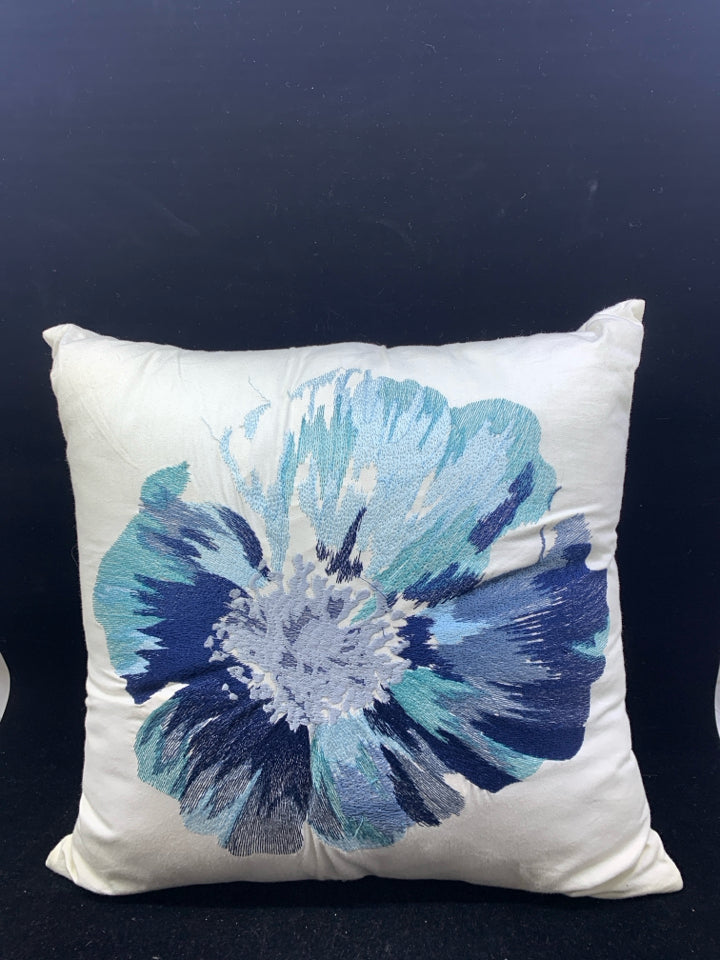 SQUARE WHITE PILLOW W/BLUE FLOWER.