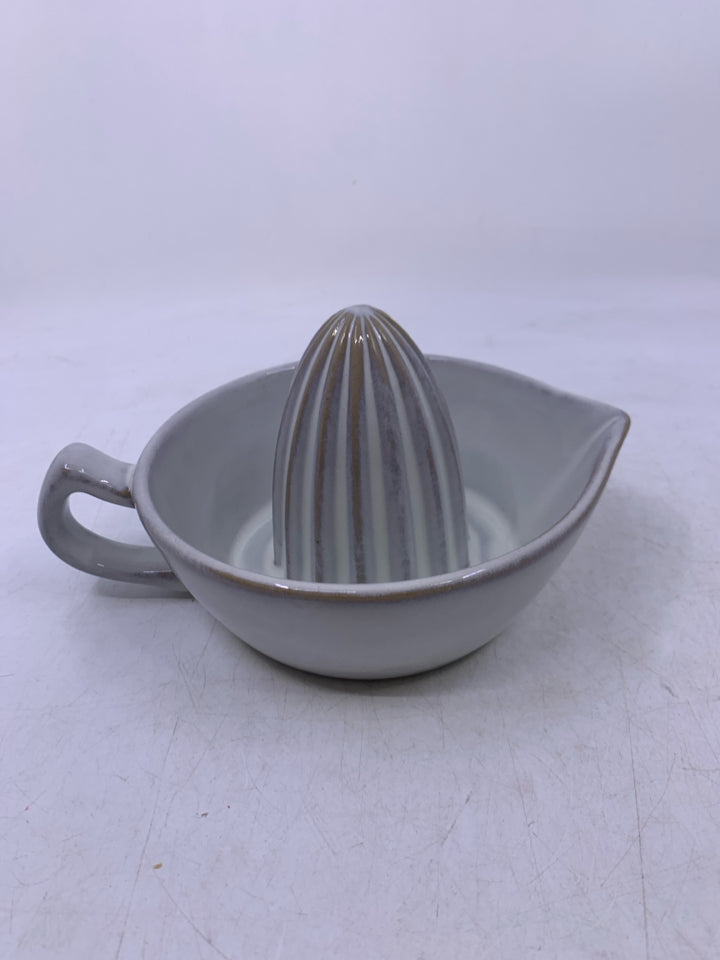 WHITE GLAZED CITRUS STONEWARE JUICER.