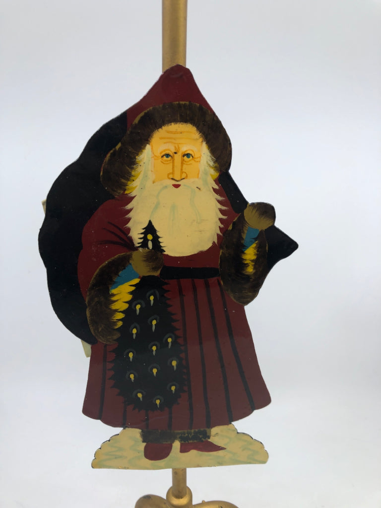 METAL SANTA TAPER CANDLE STICK.