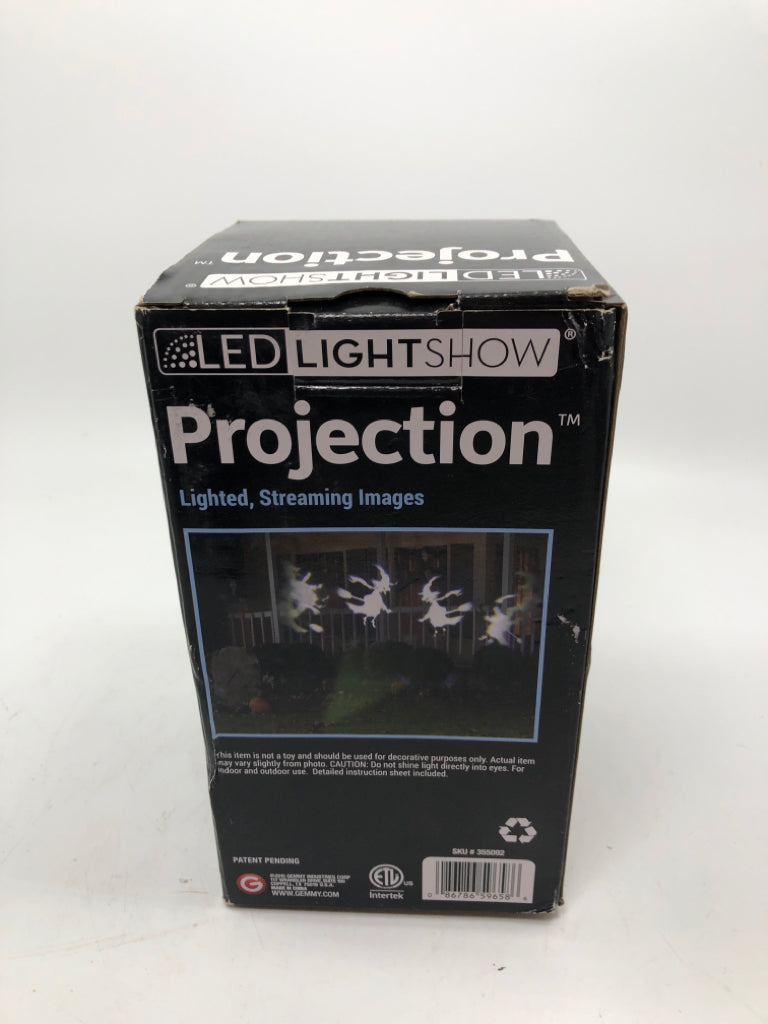 NIB WITCH PROJECTION LIGHT SHOW.