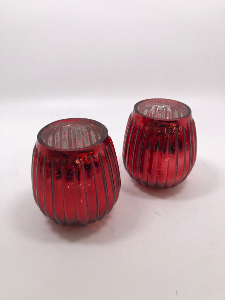 2 RED RIBBED GLASS TEALIGHT HOLDERS.