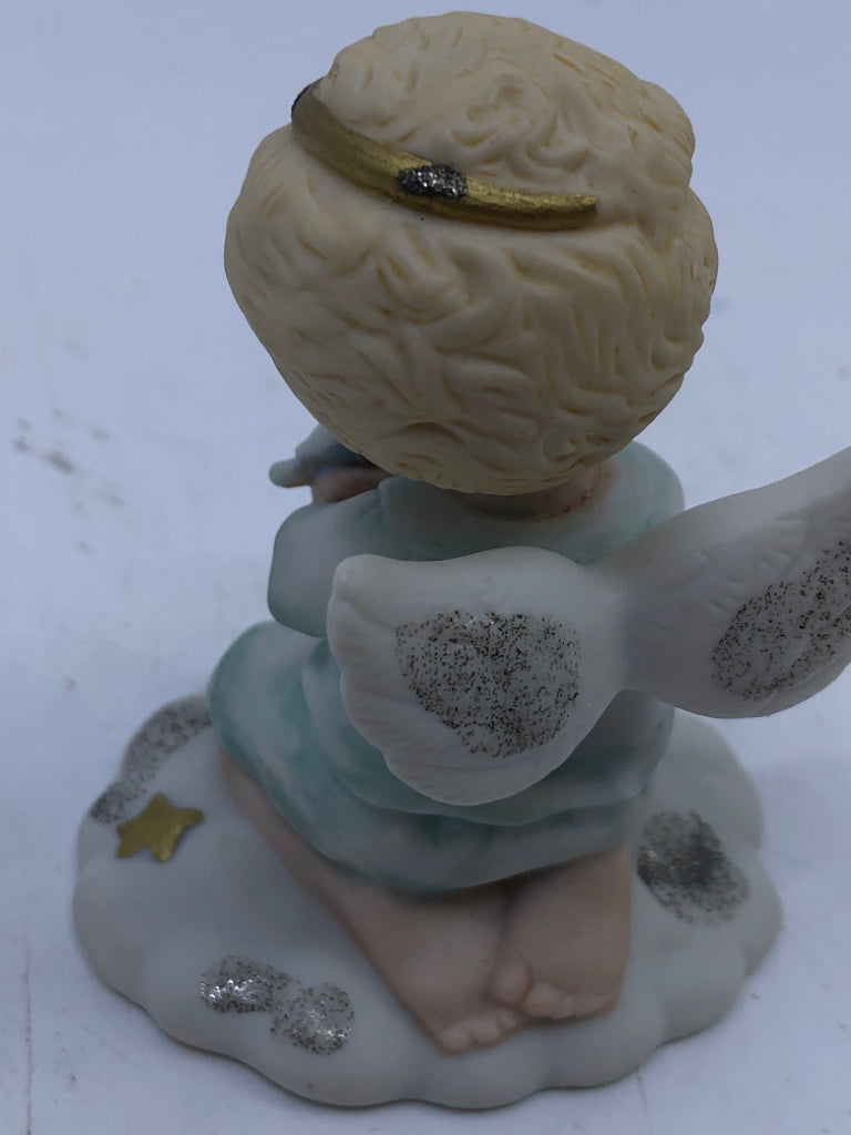 CHERUB HOLDING BIRDS.