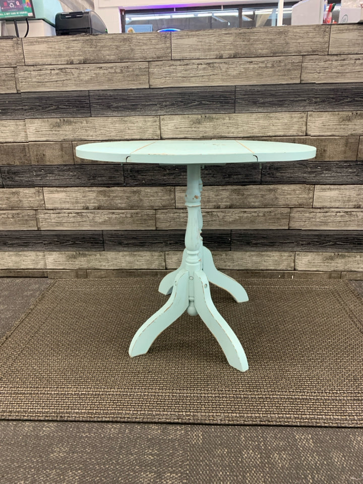 LIGHT BLUE OVAL DROP LEAF SIDE TABLE.