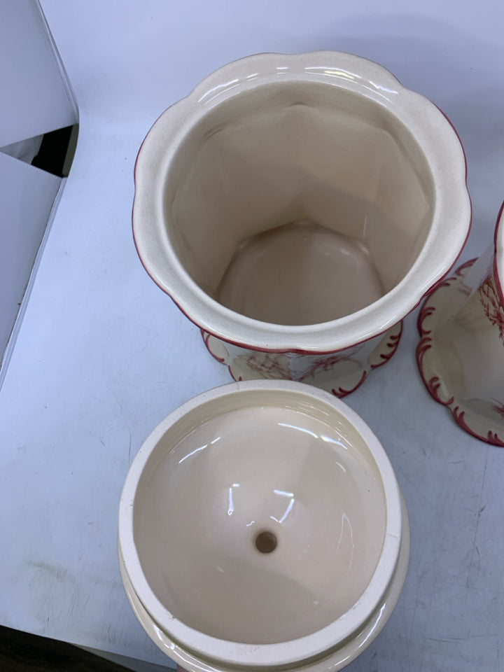 2 IVORY & RED FLORAL CANISTERS.