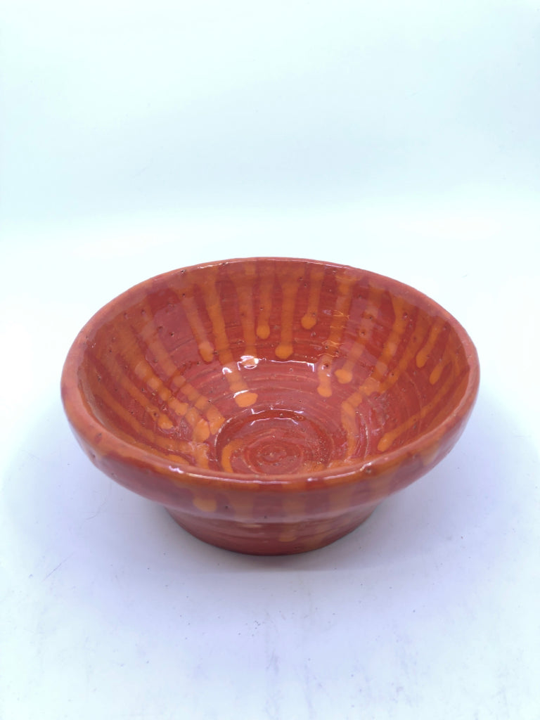 ORANGE W DRIP POTTERY DISH.