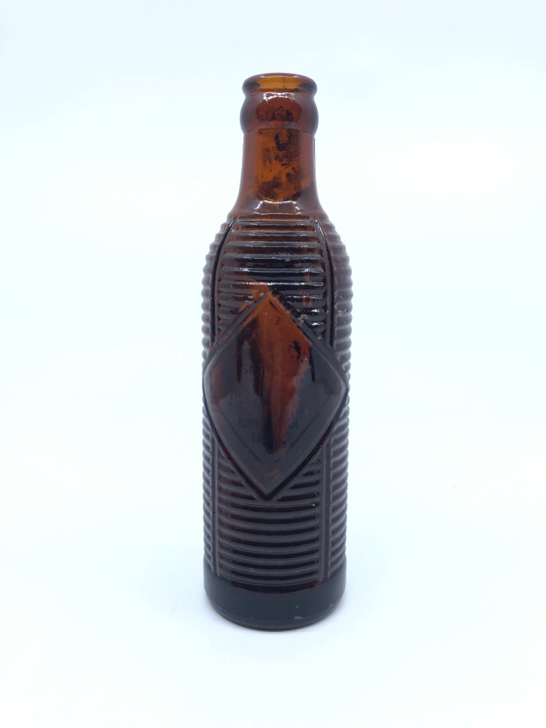 VTG BROWN RIBBED EMPTY BOTTLE.