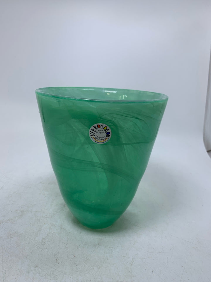 HEAVY GREEN GLASS VASE W/ WHITE SWIRL DETAILS.