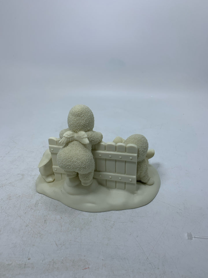 2 BABIES W/ CAN PHONES LEANING ON FENCE SNOWBABIES.