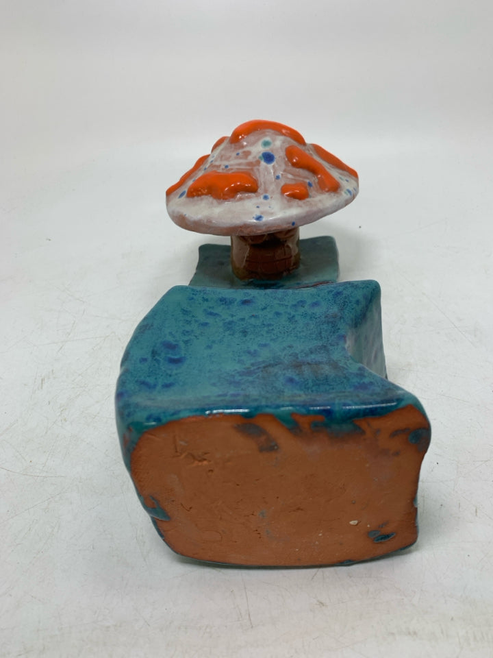 HOME MADE BLUE CANISTER W/ MUSHROOM TOP.