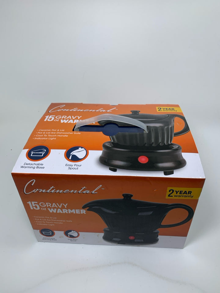 NIB GRAVY BOAT WARMER.
