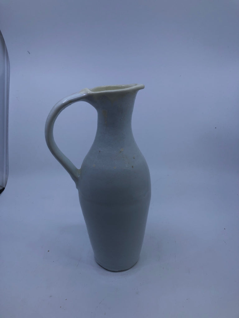 CREAM POTTERY PITCHER.