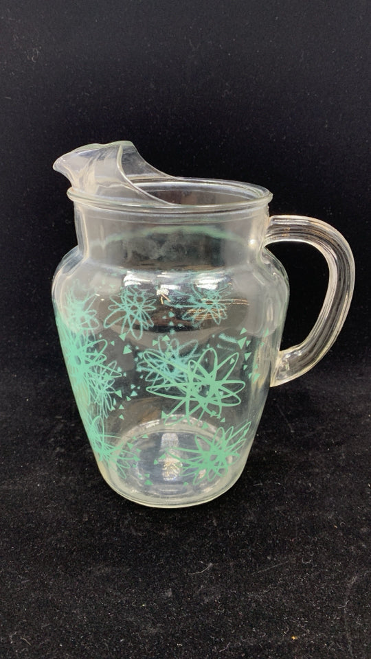 VTG TEAL STARBURST GLASS PITCHER W/ICE LIP.