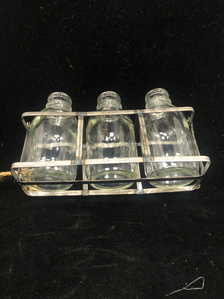 3 SM GLASS BOTTLES IN METAL CADDY.
