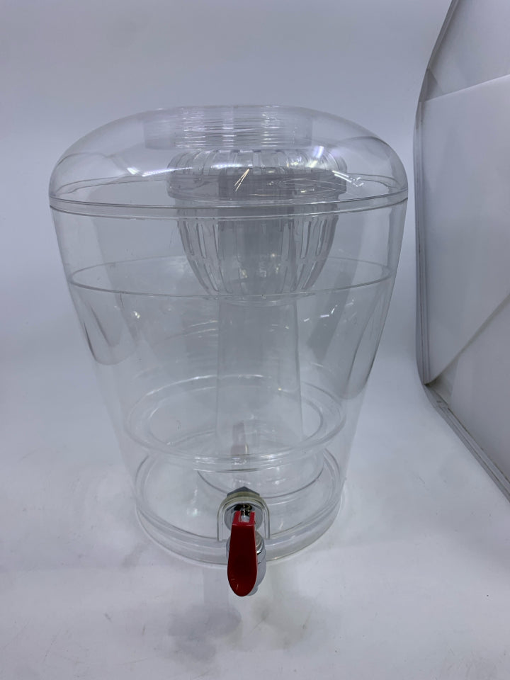PLASTIC ROUND DRINK DISPENSER W/ ICE HOLDER.