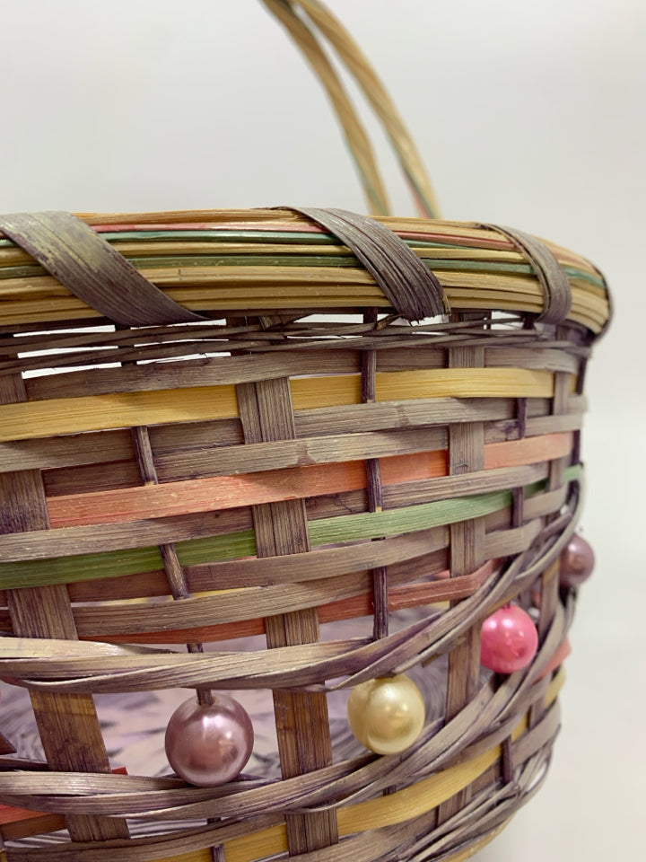 PURPLE BEADED BASKET W/WOVEN HANDLE.