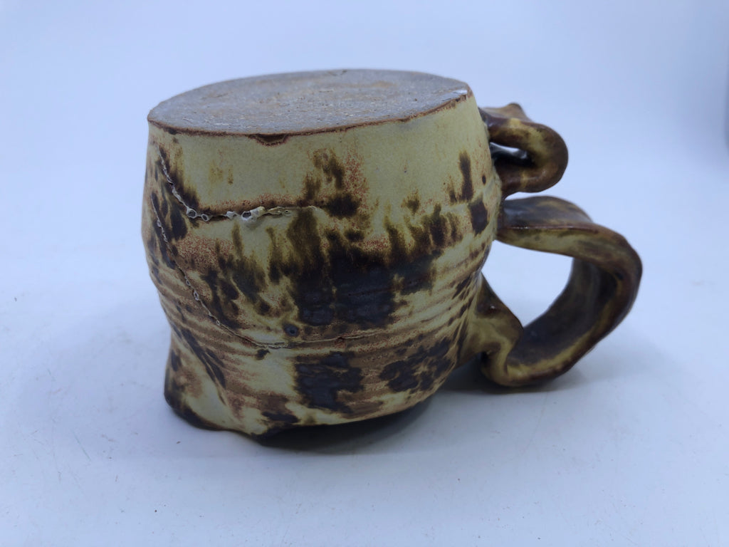 BROWN AND YELLOW COW PATTERN CREAMER.